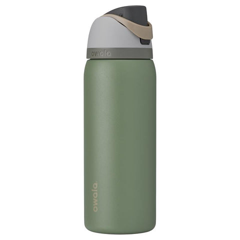 Owala FreeSip 32 oz water bottle in green house